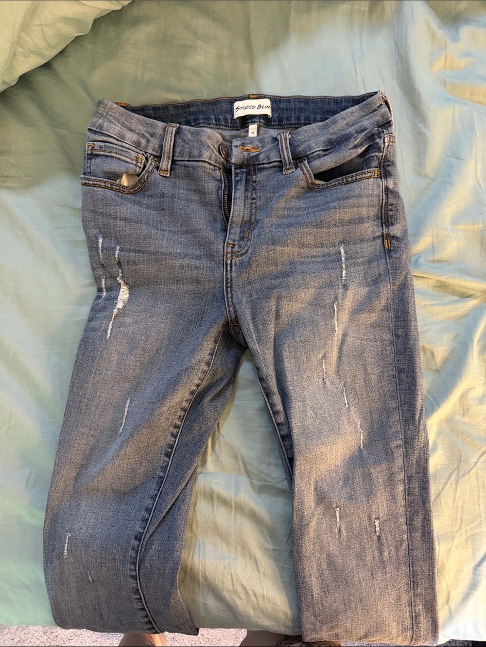 Distressed Light Blue Skinny Jeans - Women